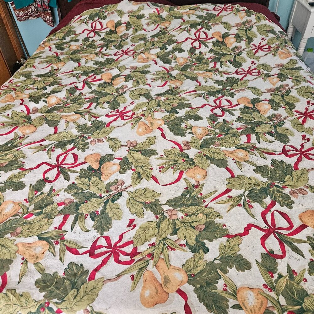 festive tablecloth with a holiday theme pears leaves red ribbons charter club